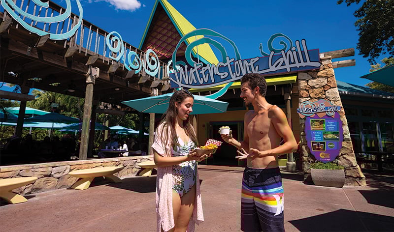 Guests enjoying food at Aquatica Orlando